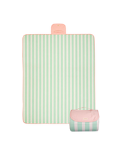 Flat lay and Folded compact play mat with handle and logo detail – toddlekind portable water resistant wander grande play mat capri for portability. Alt Img