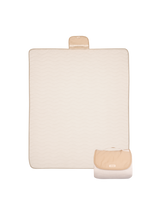 Folded compact play mat with handle and logo detail – toddlekind portable water resistant wander grande play mat tofu for portability. Alt Img