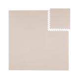 Flat lay of interlocking tiles from toddlekind baby toddler foam modern puzzle play mat classic blush.