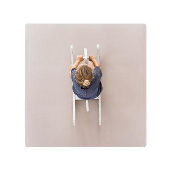 Minimal lifestyle shot of child riding toy on toddlekind baby toddler foam modern puzzle play mat classic blush. Alt Img