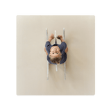 Overhead view of child on ride-on toy on toddlekind baby toddler foam modern puzzle play mat classic clay. Alt Img