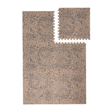 Interlocking foam tiles with one tile lifted to show puzzle edges of the toddlekind baby toddler foam modern designer puzzle play mat haven wild driftwood.