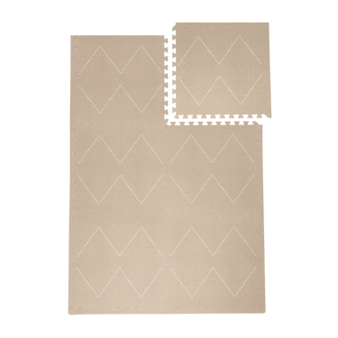 Interlocking tile layout with one piece removed showing the toddlekind baby toddler foam modern designer puzzle play mat haven tulum dessert caliza.