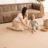 Mother and toddler playing with wooden toys on the toddlekind baby toddler foam modern designer puzzle play mat haven deco latte.