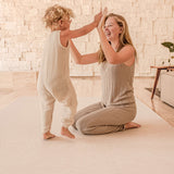 mom and child playing on toddlekind haven foam puzzle play mat in wild dune