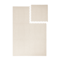 Interlocking foam tiles with one tile removed from toddlekind baby toddler foam modern designer puzzle play mat haven deco ecru.