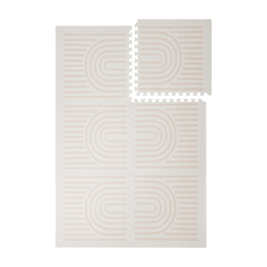 Interlocking foam tiles arranged in a grid with one corner lifted showing edges of the toddlekind baby toddler foam modern designer puzzle play mat haven linear linen.