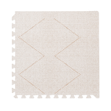 Close-up of a single textured tile with subtle diamond pattern from the toddlekind baby toddler foam modern designer puzzle play mat haven tulum bone. Alt Img