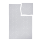 Interlocking tile layout with one piece removed showing the toddlekind baby toddler foam modern designer puzzle play mat haven tulum stone.
