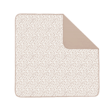 Flat lay product image of a floral play mat with a folded corner showing the underside, displaying the toddlekind portable water resistant wander classic play mat botanical earthen design and material. Alt Img