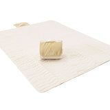 Full view of unfolded neutral play mat with folded section on top – toddlekind portable water resistant wander grande play mat tofu for versatile use