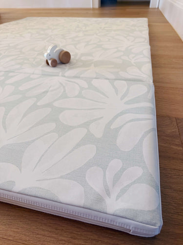 Detailed corner view of toddlekind baby toddler foldable foam cushioned tumble play mat willow frost showing soft padding and design.
