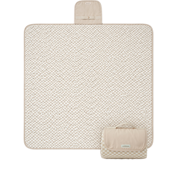 Flat lay product image of a floral play mat with a folded corner showing the underside, displaying the toddlekind portable water resistant wander classic play mat botanical earthen design and material. Alt Img