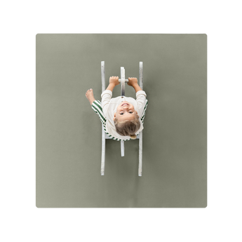 Overhead view of toddler riding toy on toddlekind baby toddler foam modern puzzle play mat classic grove. Alt Img