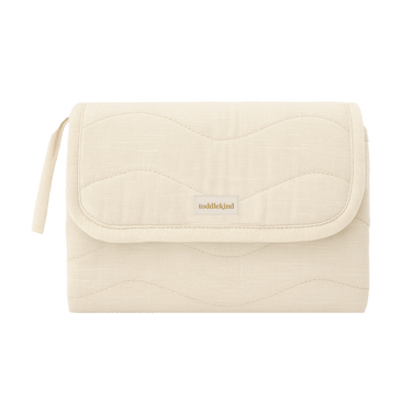 Closed toddlekind baby portable changing clutch mini maven tofu with strap for easy carrying and travel.
