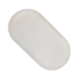 Top view of toddlekind baby foam changing pad nest pad turtle dove highlighting soft contoured form.
