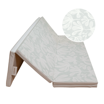 Folded triangle setup of toddlekind baby toddler foldable foam cushioned tumble play mat willow frost with soft botanical pattern. Alt Img