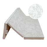 Folded triangle setup of toddlekind baby toddler foldable foam cushioned tumble play mat willow frost with soft botanical pattern. Alt Img