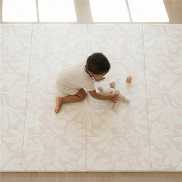 Baby crawling across soft surface on toddlekind baby toddler foldable foam cushioned tumble play mat willow ava.

