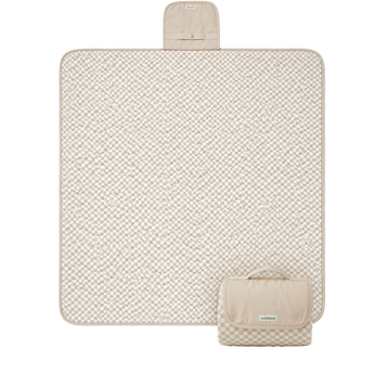Flat lay product image of a floral play mat with a folded corner showing the underside, displaying the toddlekind portable water resistant wander classic play mat botanical earthen design and material. Alt Img