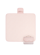 Flat lay product image of a floral play mat with a folded corner showing the underside, displaying the toddlekind portable water resistant wander classic play mat check powder design and material. Alt Img