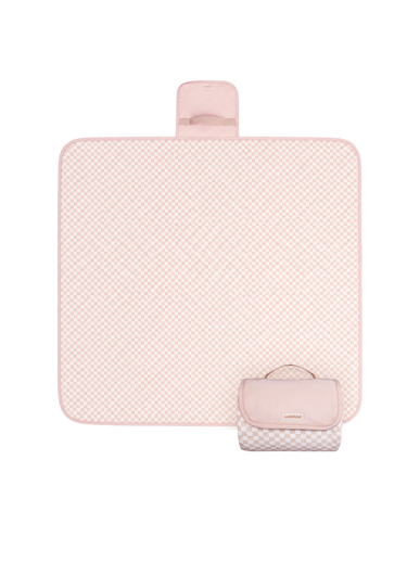 Flat lay product image of a floral play mat with a folded corner showing the underside, displaying the toddlekind portable water resistant wander classic play mat check powder design and material. Alt Img