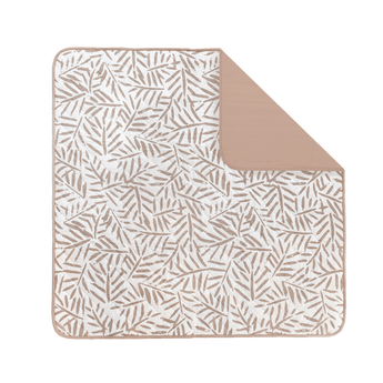 Flat lay of leaf-pattern play mat with corner fold detail – toddlekind portable water resistant wander classic play mat ocean tan showcasing reversible design. Alt Img
